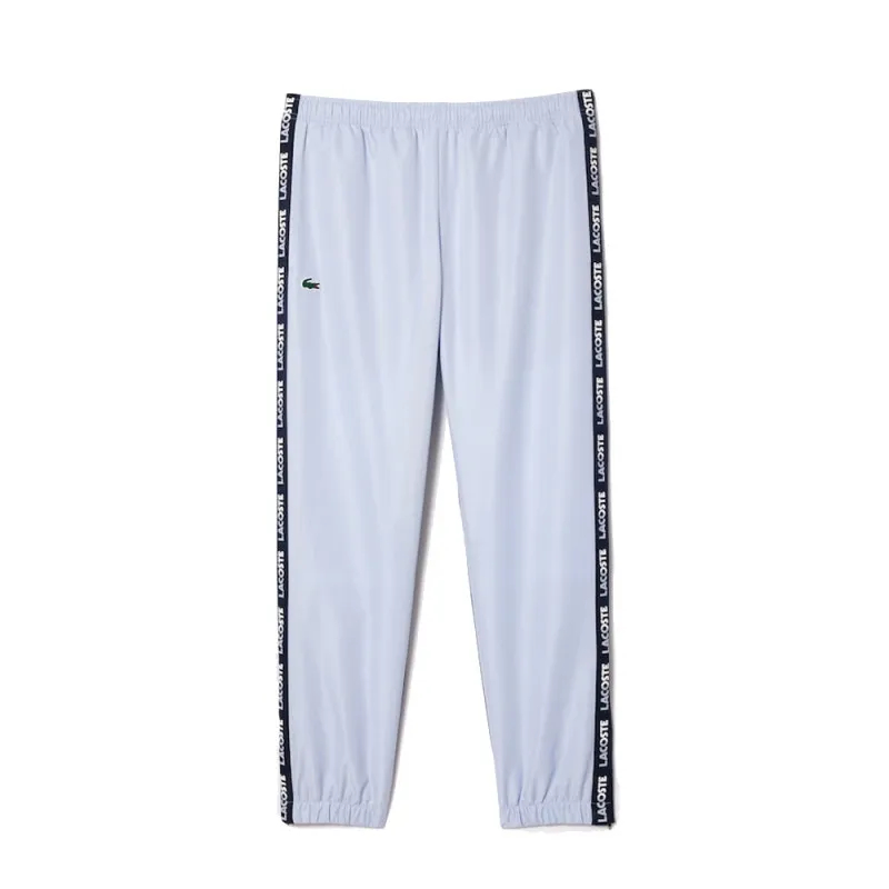 PANTALON DE SURVÊTEMENT LACOSTE TENNIS SPORTSUIT DOUBLÉ BLEU MARINE ET BLEU